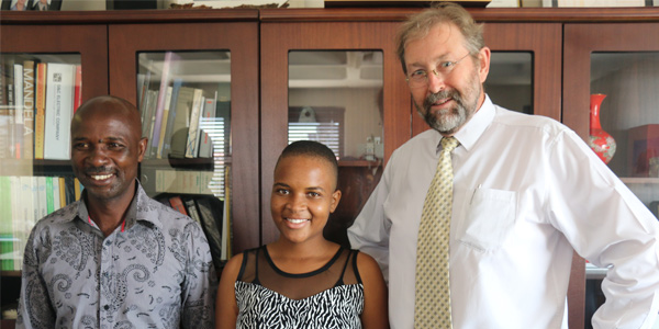 Triphin Mudzvengi flanked by her father Polate Mudzvengi and Prof. Ian Jandrell, Dean of the Faculty of Engineering and the Built Enviroment Triphin Mudzvengi flanked by her father Polate Mudzvengi and Prof. Ian Jandrell, Dean of the Faculty of Engineering and the Built Enviroment